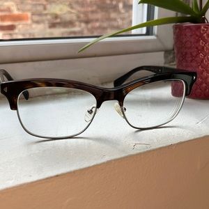 Prada Tortoiseshell Eyeglasses PR22OV - horn rimmed